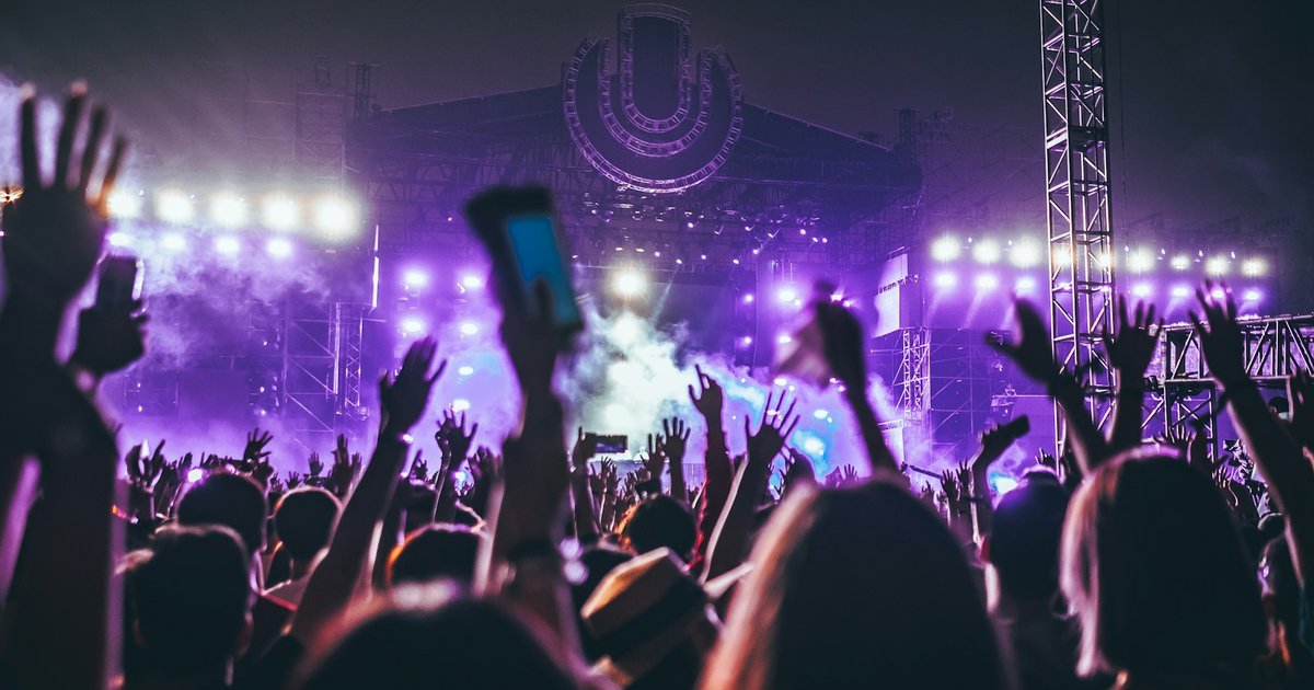 Crowd facing the KEMBA Live stage on an outdoor concert night