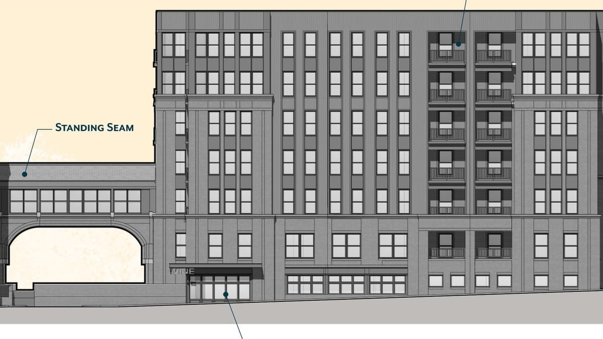 Architectural elevation drawing of One Twenty Vine seven-story apartments with skywalk over garage entry