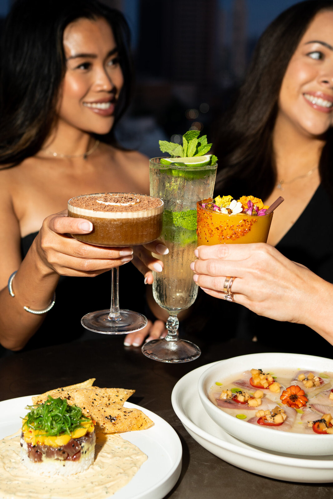 Cocktails and seafood plates at Astra Rooftop on Park Street