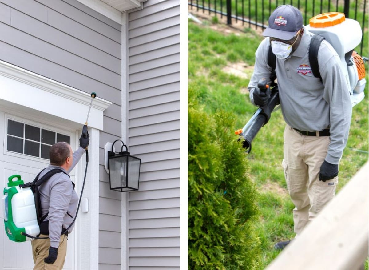Champion Pest Control technicians treating a home exterior and landscaping