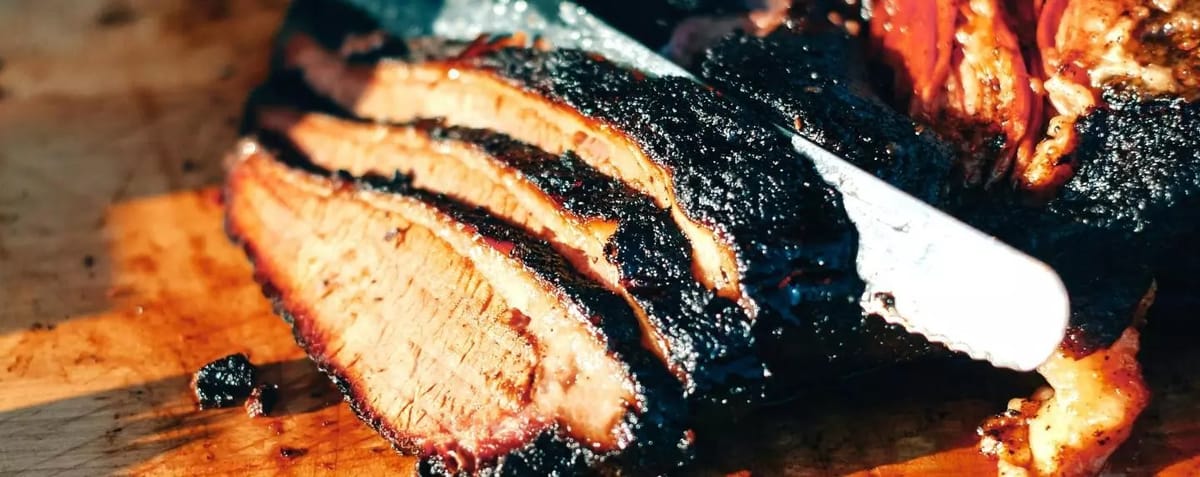 Sliced City Barbeque brisket with pink smoke ring