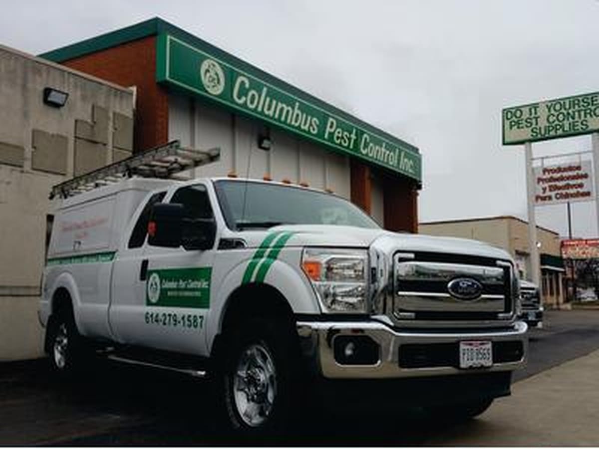 Columbus Pest Control Inc. storefront and branded service truck