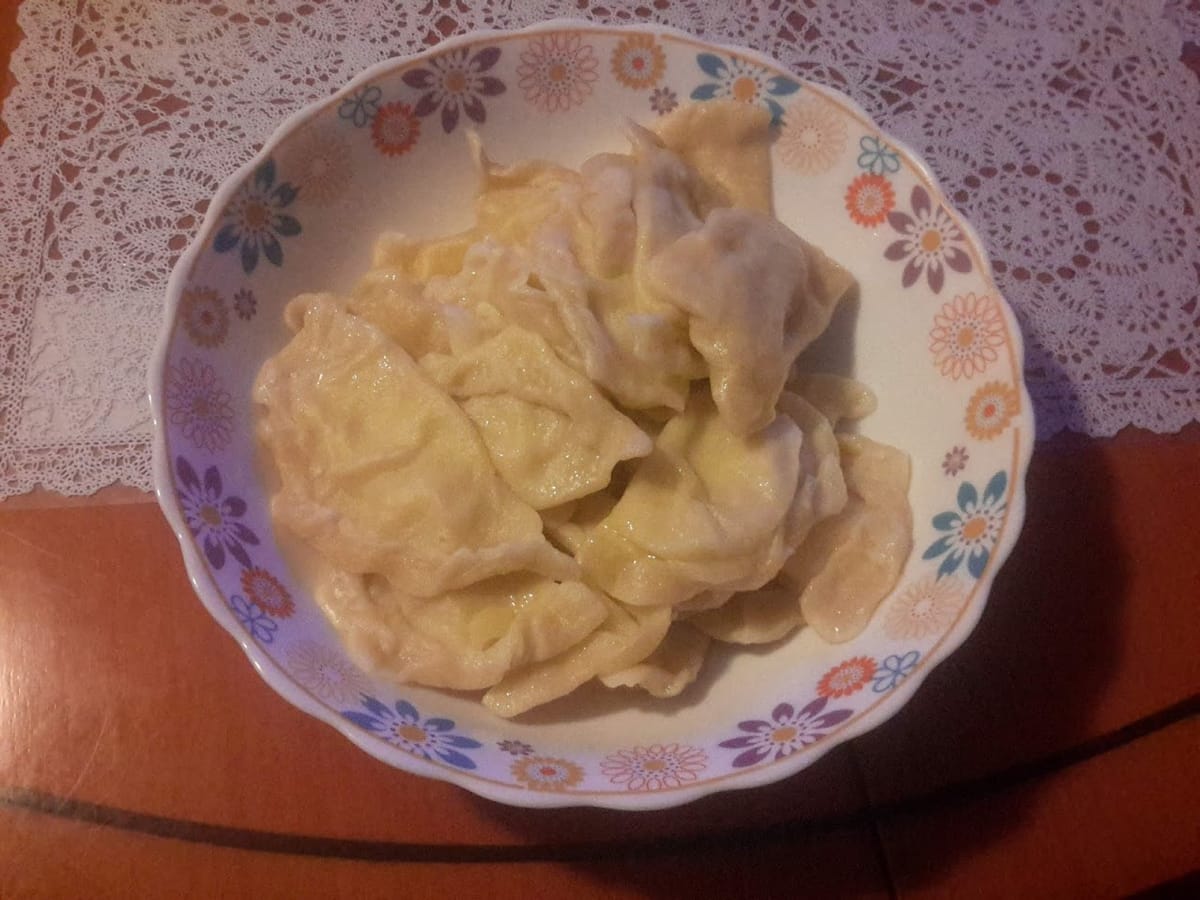 Bowl of buttered pierogies representing Gallo's Tap Room menu pierogies