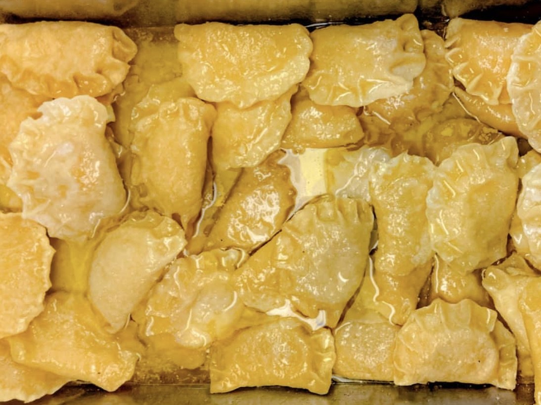 Tray of buttered pierogies at Hubert's Polish Kitchen style plating