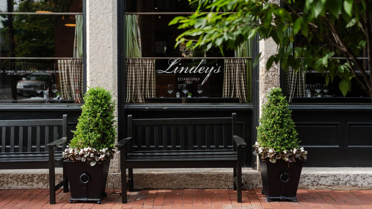 Lindey's storefront windows and brick sidewalk in German Village