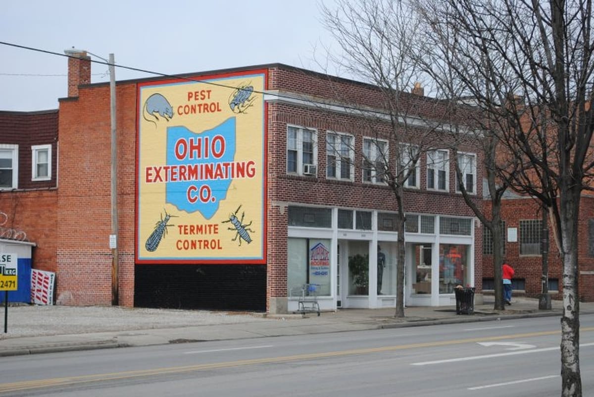 Brick building mural for Ohio Exterminating Co. pest and termite control