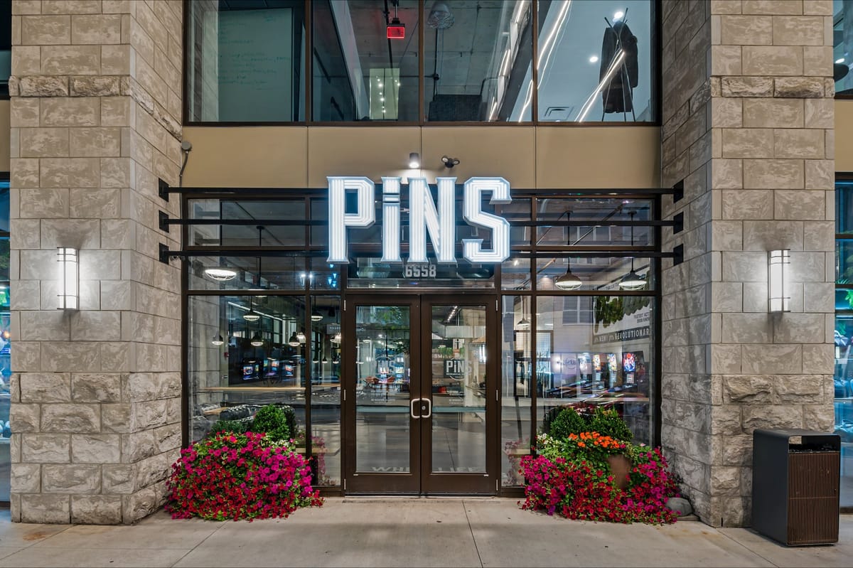 Pins Mechanical Bridge Park Dublin neon storefront entrance