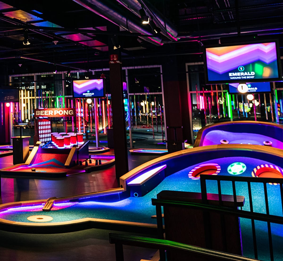 Puttshack Columbus tech mini golf course and lounge seating