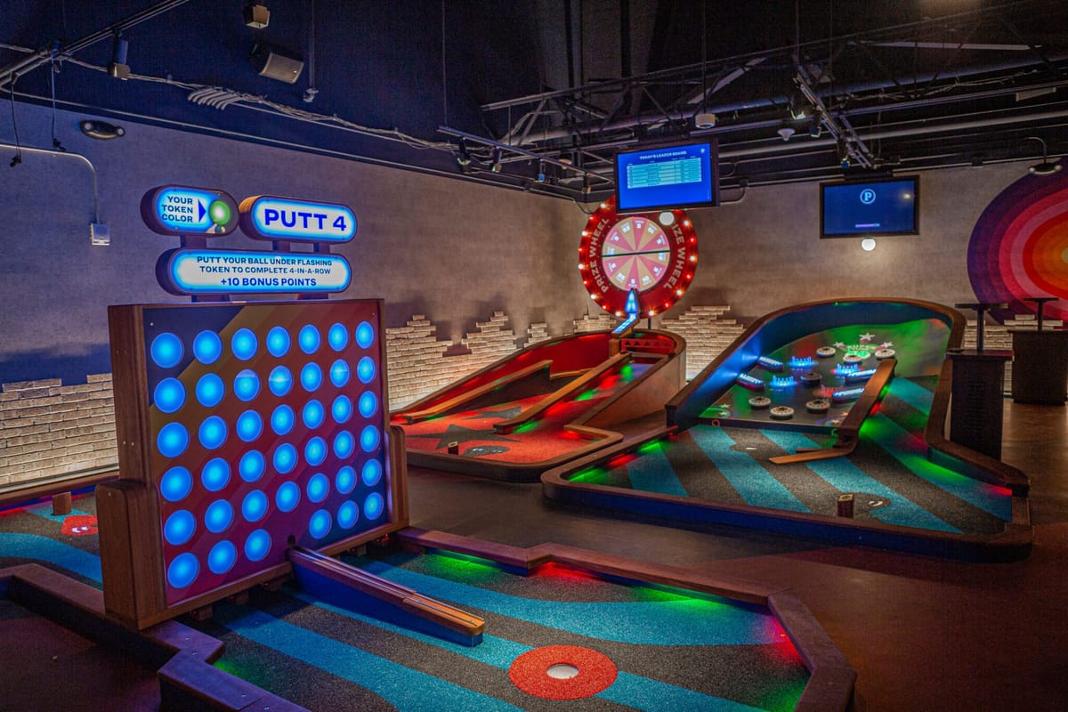 Puttshack Columbus tech mini-golf course and neon lounge
