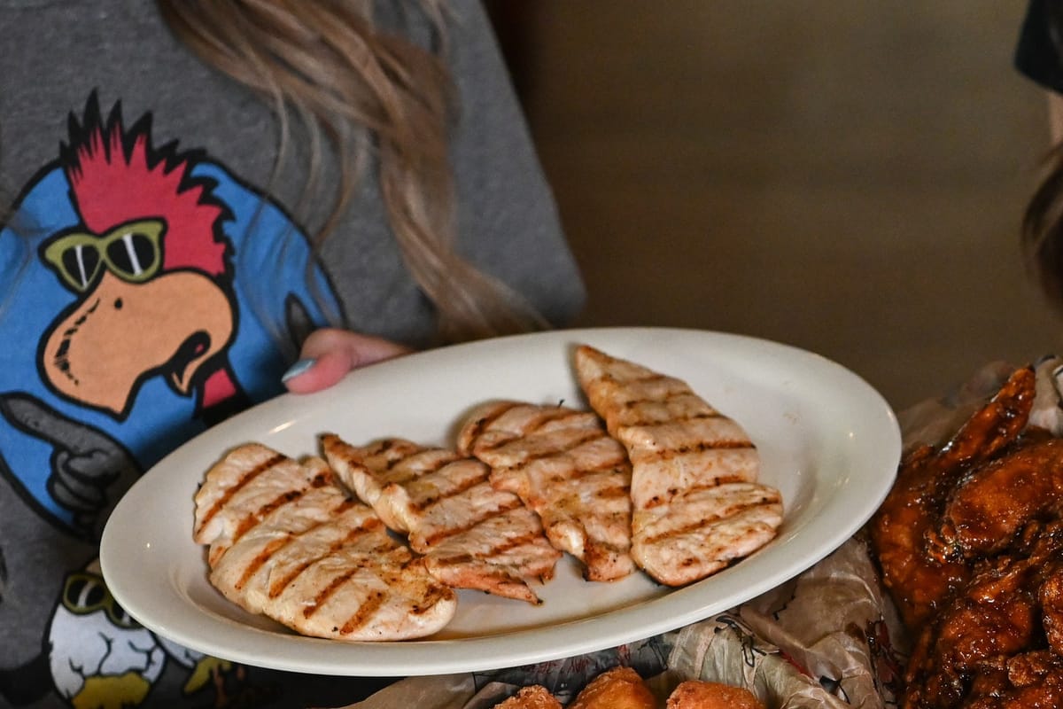 Roosters grilled chicken tenders on a plate