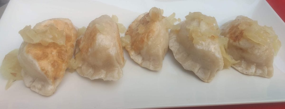 Handmade pierogi plate representing Sweet CLE-'bus flavors